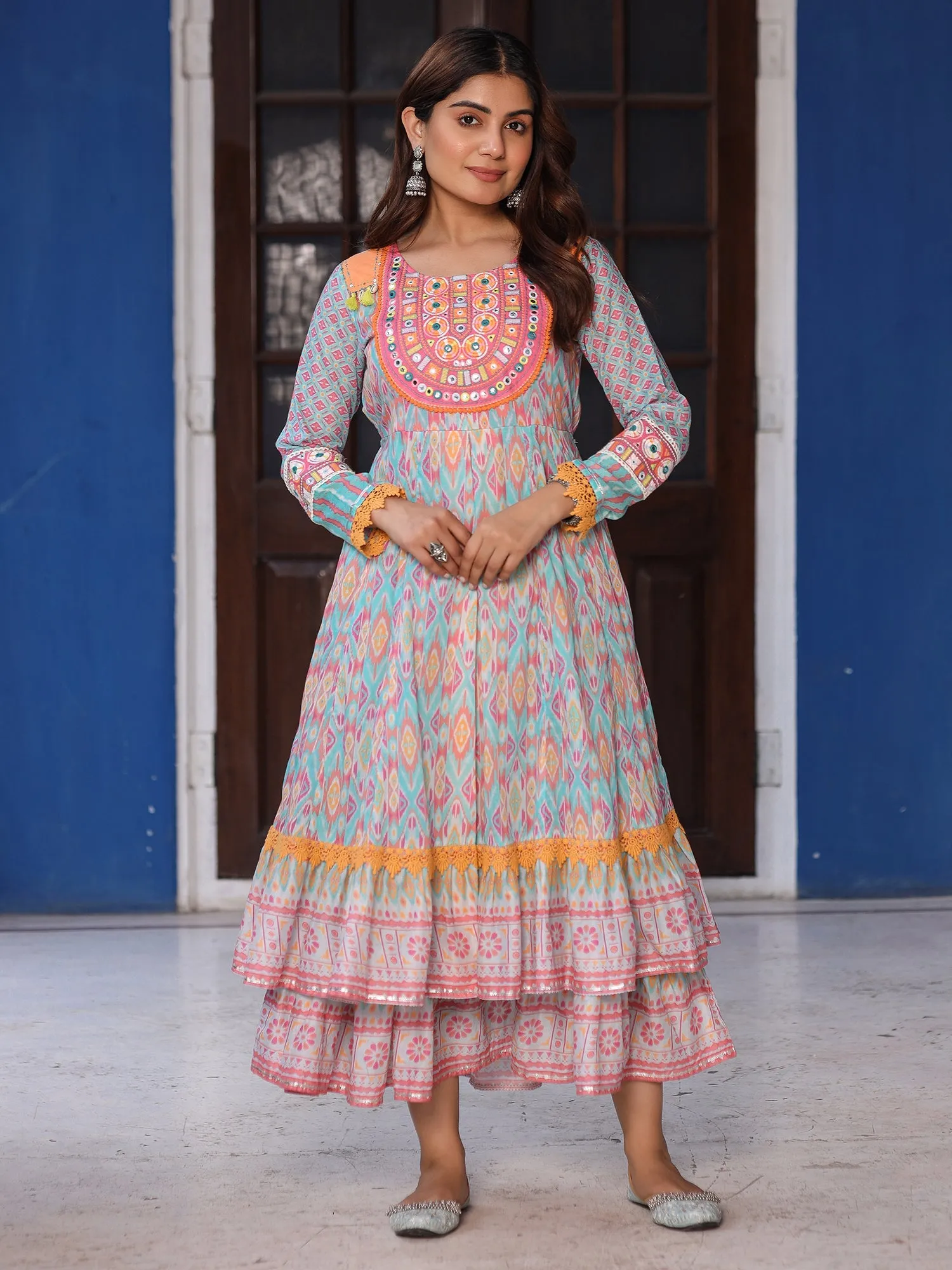 Jashvi Sky Blue Cotton Ikat Printed Maxi Dress With Thread Embroidery & Dori Tassel Tie-Up At Waist